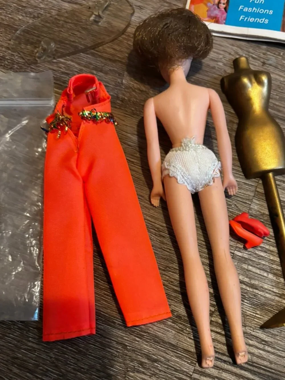 Topper Dawn Head to Toe wearing original orange jumpsuit w/long braid